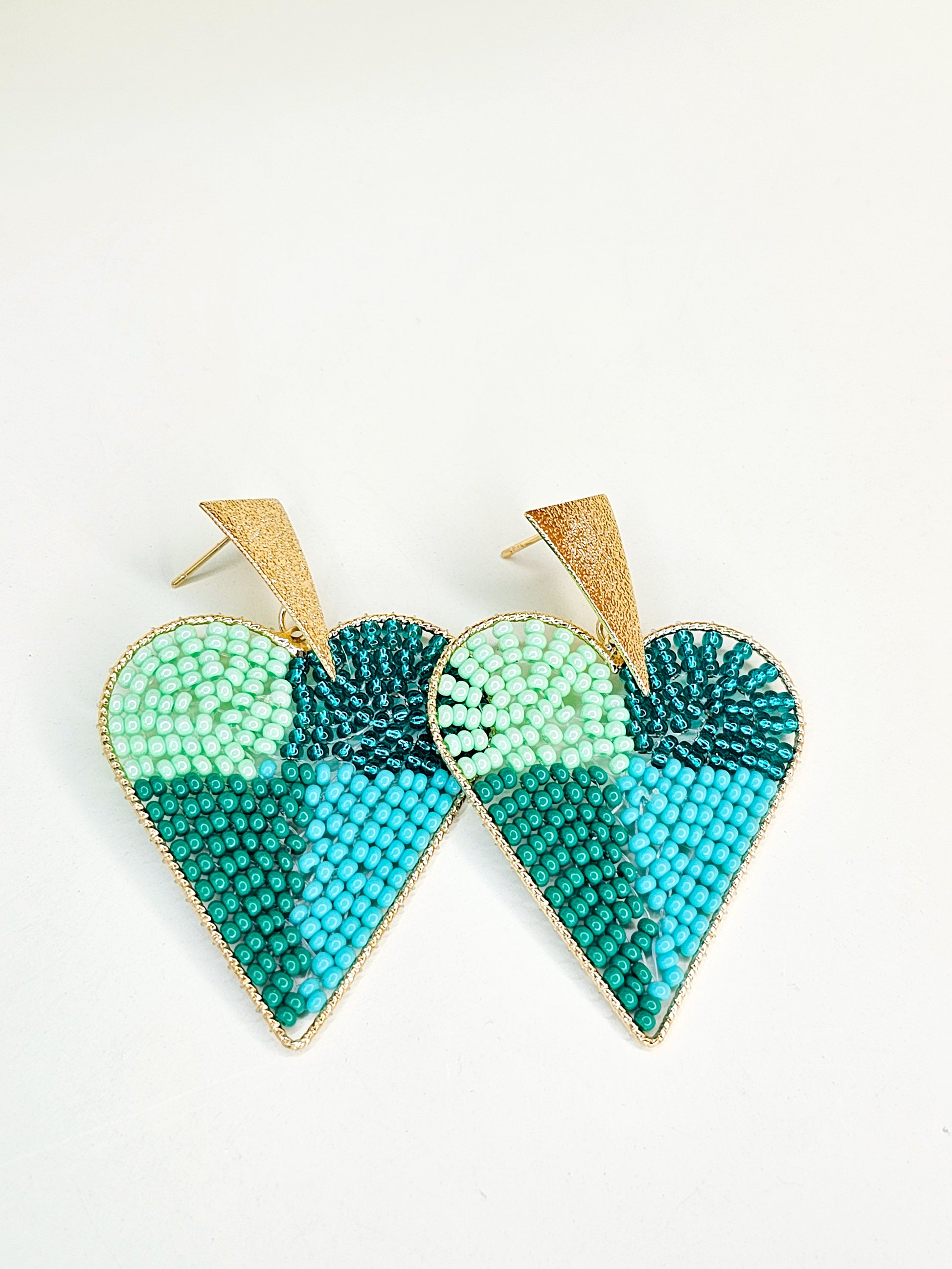 Large beaded green heart earrings