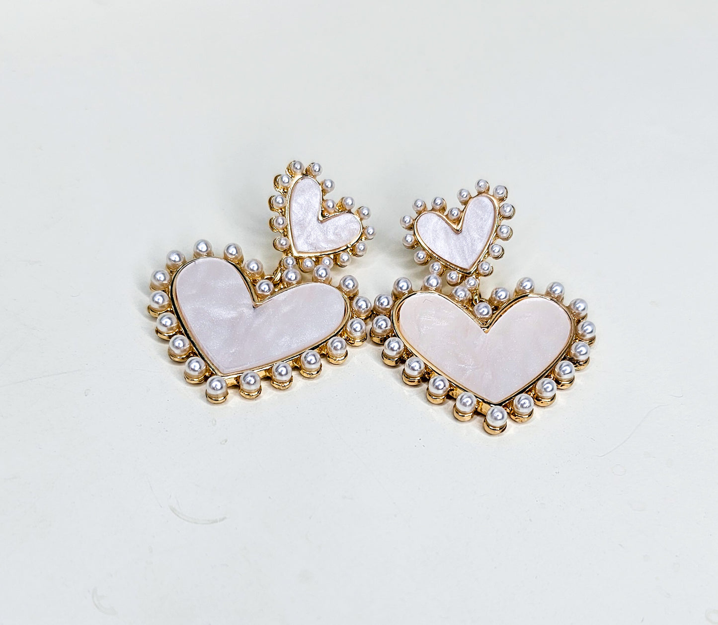 Large heart pearl earrings